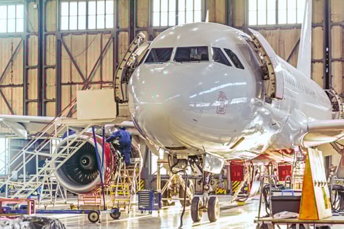 Maintenance on commercial aircraft in the Hangar.